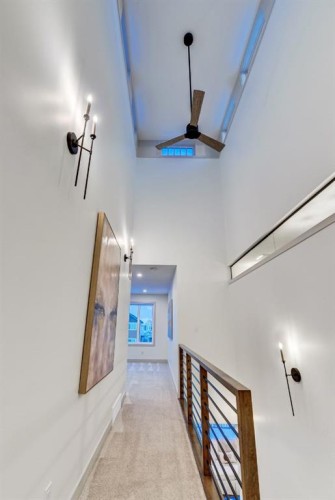 128 Sunrise Heath, Cochrane, AB - Indoor Photo Showing Other Room