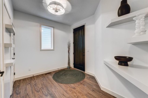 128 Sunrise Heath, Cochrane, AB - Indoor Photo Showing Other Room