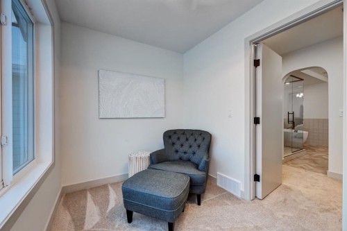 128 Sunrise Heath, Cochrane, AB - Indoor Photo Showing Other Room