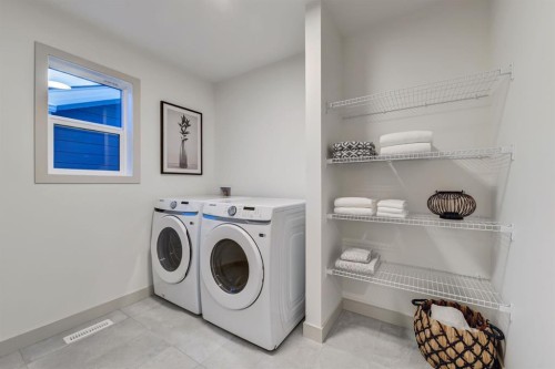 128 Sunrise Heath, Cochrane, AB - Indoor Photo Showing Laundry Room