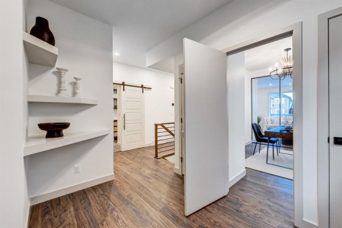 128 Sunrise Heath, Cochrane, AB - Indoor Photo Showing Other Room