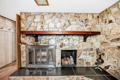 5202 44 Street, Olds, AB - Indoor With Fireplace