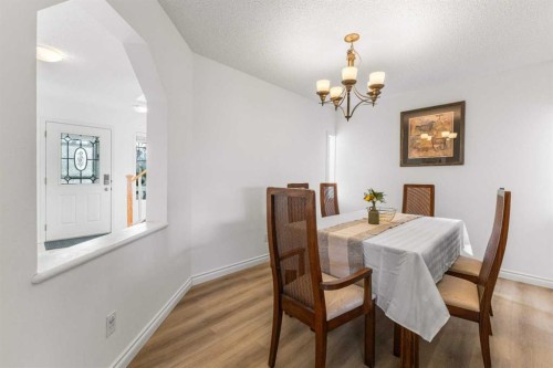 26 Arbour Butte Way Nw, Calgary, AB - Indoor Photo Showing Dining Room