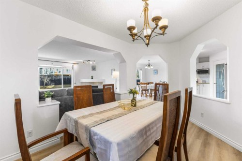 26 Arbour Butte Way Nw, Calgary, AB - Indoor Photo Showing Dining Room