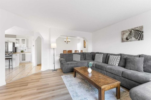26 Arbour Butte Way Nw, Calgary, AB - Indoor Photo Showing Living Room