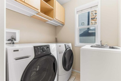 26 Arbour Butte Way Nw, Calgary, AB - Indoor Photo Showing Laundry Room