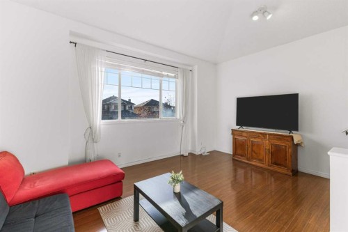26 Arbour Butte Way Nw, Calgary, AB - Indoor Photo Showing Living Room