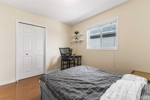 26 Arbour Butte Way Nw, Calgary, AB - Indoor Photo Showing Bedroom