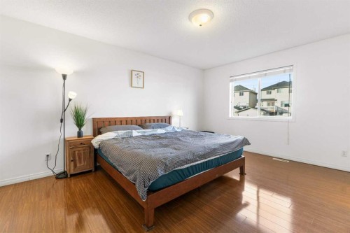 26 Arbour Butte Way Nw, Calgary, AB - Indoor Photo Showing Bedroom