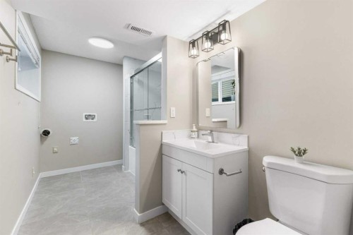 26 Arbour Butte Way Nw, Calgary, AB - Indoor Photo Showing Bathroom