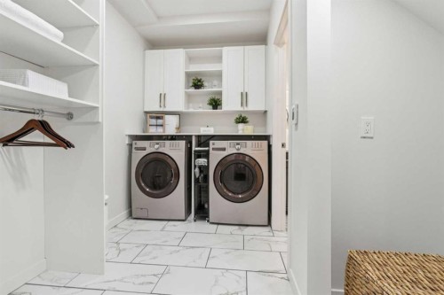 50 Riviera View, Cochrane, AB - Indoor Photo Showing Laundry Room