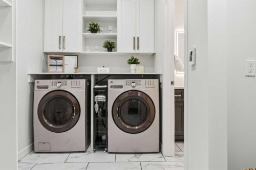 50 Riviera View, Cochrane, AB - Indoor Photo Showing Laundry Room
