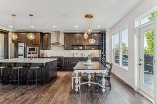 50 Riviera View, Cochrane, AB - Indoor Photo Showing Kitchen With Stainless Steel Kitchen With Upgraded Kitchen