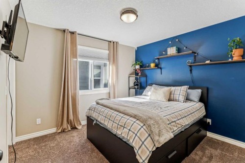 50 Riviera View, Cochrane, AB - Indoor Photo Showing Bedroom