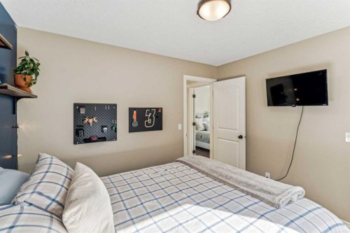 50 Riviera View, Cochrane, AB - Indoor Photo Showing Bedroom