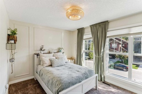 50 Riviera View, Cochrane, AB - Indoor Photo Showing Bedroom