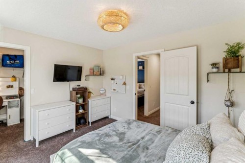 50 Riviera View, Cochrane, AB - Indoor Photo Showing Bedroom
