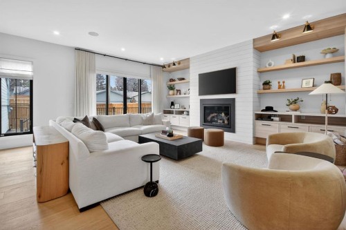 6515 Longmoor Way Sw, Calgary, AB - Indoor Photo Showing Living Room With Fireplace