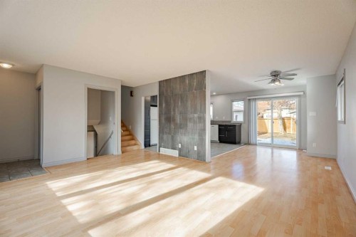 4707 Brockington Road Nw, Calgary, AB - Indoor Photo Showing Living Room