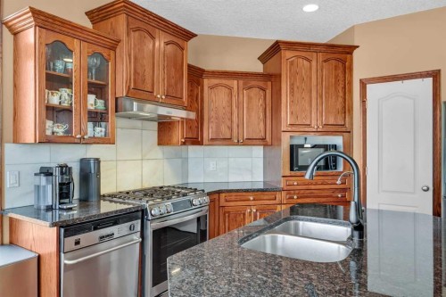 10409 Hamptons Boulevard Nw, Calgary, AB - Indoor Photo Showing Kitchen With Double Sink