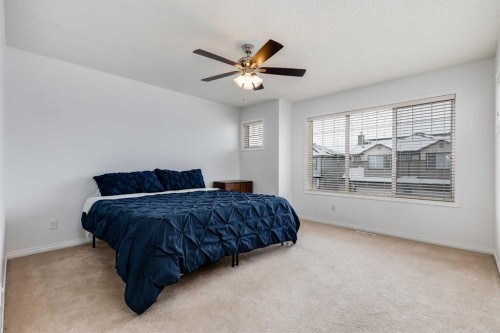 2 Everridge Villas Sw, Calgary, AB - Indoor Photo Showing Bedroom
