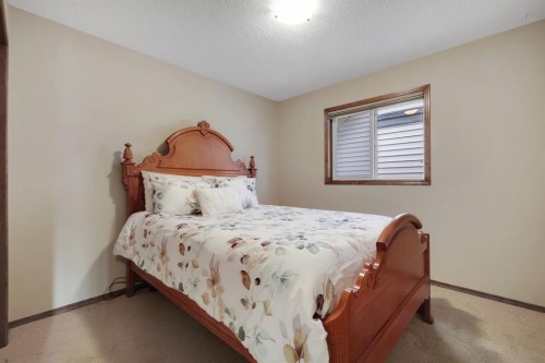 184 Brightondale Parade Se, Calgary, AB - Indoor Photo Showing Bedroom