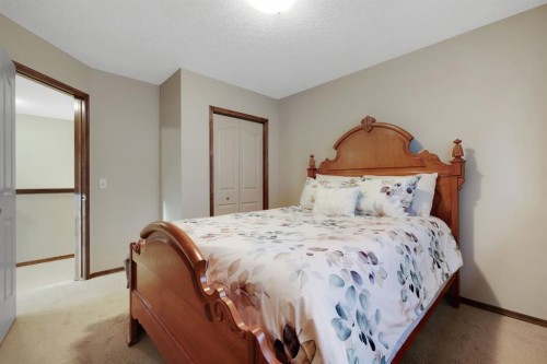 184 Brightondale Parade Se, Calgary, AB - Indoor Photo Showing Bedroom
