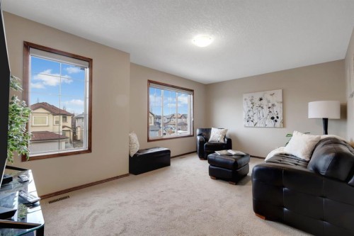 184 Brightondale Parade Se, Calgary, AB - Indoor Photo Showing Living Room