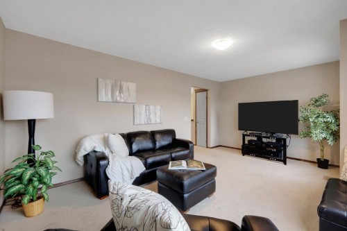 184 Brightondale Parade Se, Calgary, AB - Indoor Photo Showing Living Room