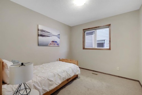 184 Brightondale Parade Se, Calgary, AB - Indoor Photo Showing Bedroom