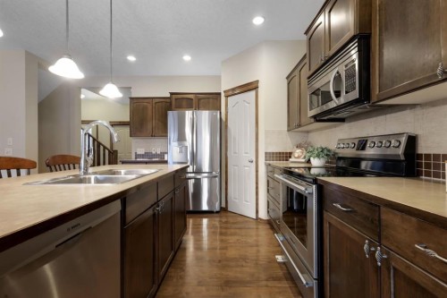 184 Brightondale Parade Se, Calgary, AB - Indoor Photo Showing Kitchen With Double Sink With Upgraded Kitchen