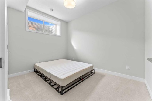 919 Walgrove Boulevard Se, Calgary, AB - Indoor Photo Showing Bedroom