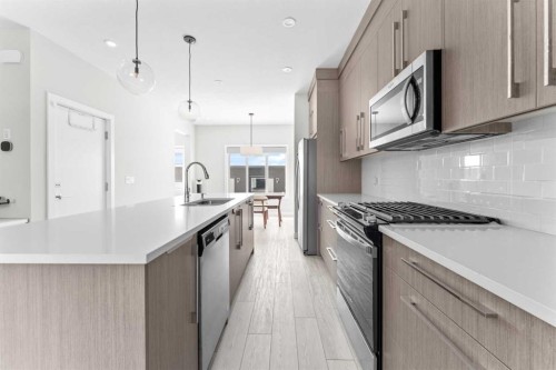 919 Walgrove Boulevard Se, Calgary, AB - Indoor Photo Showing Kitchen With Upgraded Kitchen