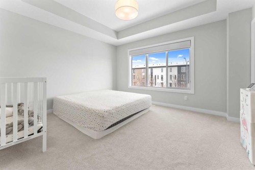 919 Walgrove Boulevard Se, Calgary, AB - Indoor Photo Showing Bedroom