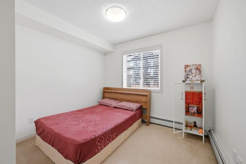 2119-175 Panatella Hill Nw, Calgary, AB - Indoor Photo Showing Bedroom
