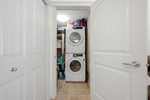 2119-175 Panatella Hill Nw, Calgary, AB - Indoor Photo Showing Laundry Room