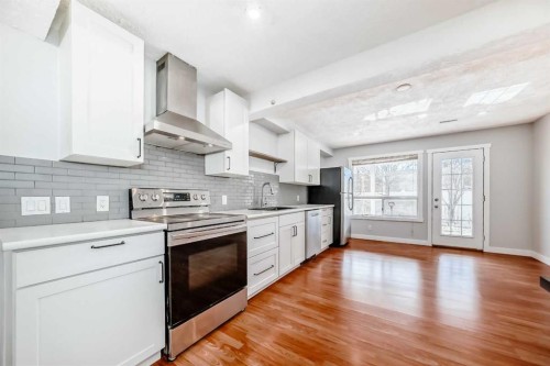 61 Citadel Hills Circle Nw, Calgary, AB - Indoor Photo Showing Kitchen With Upgraded Kitchen