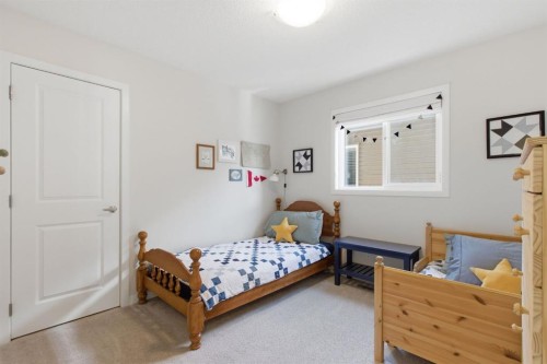 316 Sundown View, Cochrane, AB - Indoor Photo Showing Bedroom