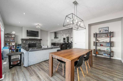 125 Sage Bluff Close Nw, Calgary, AB - Indoor Photo Showing Living Room With Fireplace