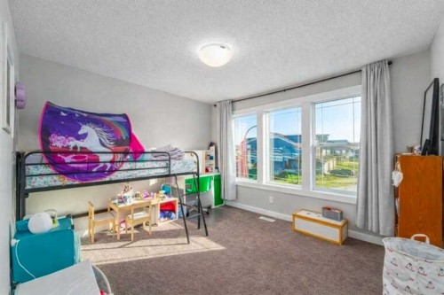 125 Sage Bluff Close Nw, Calgary, AB - Indoor Photo Showing Bedroom