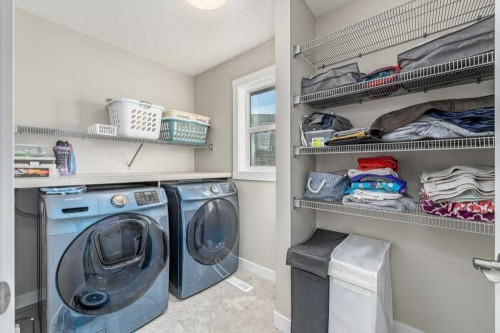 125 Sage Bluff Close Nw, Calgary, AB - Indoor Photo Showing Laundry Room