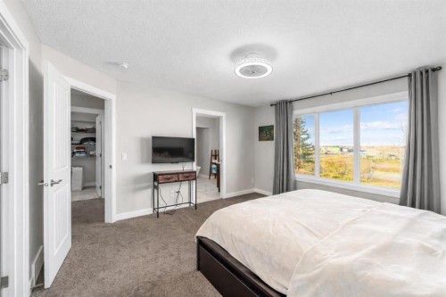 125 Sage Bluff Close Nw, Calgary, AB - Indoor Photo Showing Bedroom