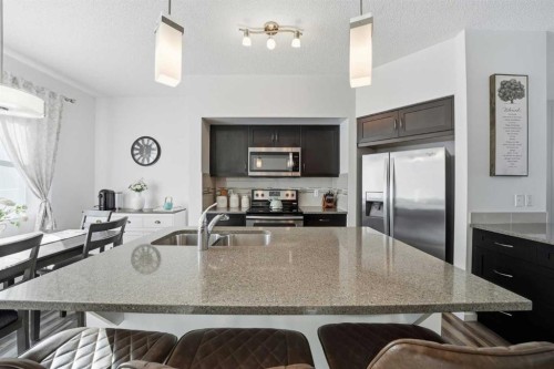 189 Mahogany Drive, Calgary, AB - Indoor Photo Showing Kitchen With Stainless Steel Kitchen With Double Sink With Upgraded Kitchen