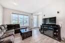 7468 202 Avenue Se, Calgary, AB  - Indoor Photo Showing Living Room 