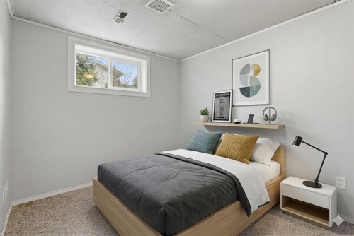 6137 Maddock Drive Ne, Calgary, AB - Indoor Photo Showing Bedroom