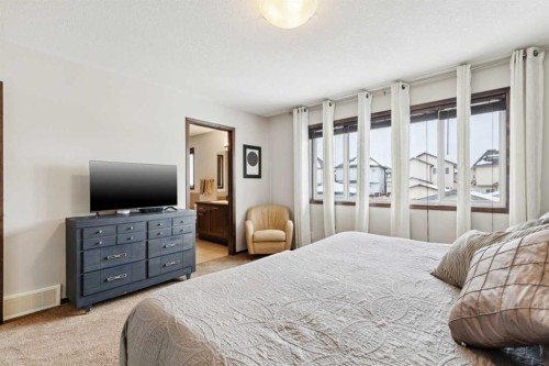 69 Elgin Meadows Manor Se, Calgary, AB - Indoor Photo Showing Bedroom