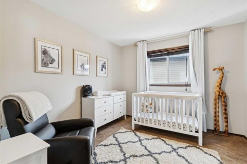 69 Elgin Meadows Manor Se, Calgary, AB - Indoor Photo Showing Bedroom