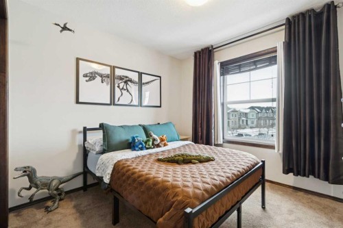 69 Elgin Meadows Manor Se, Calgary, AB - Indoor Photo Showing Bedroom