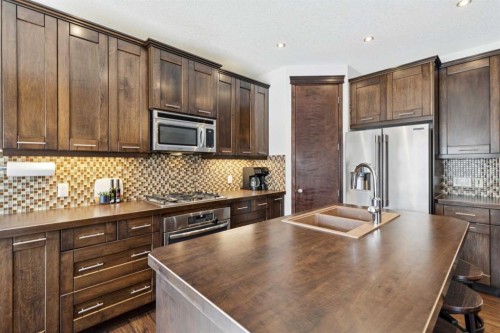 69 Elgin Meadows Manor Se, Calgary, AB - Indoor Photo Showing Kitchen With Stainless Steel Kitchen With Double Sink With Upgraded Kitchen