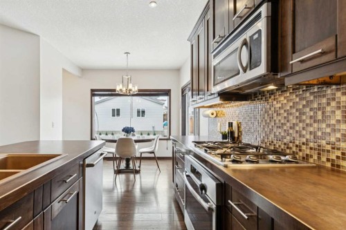 69 Elgin Meadows Manor Se, Calgary, AB - Indoor Photo Showing Kitchen With Double Sink With Upgraded Kitchen
